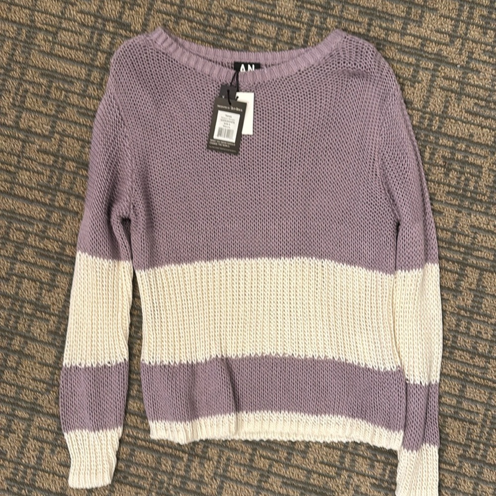 Alp N Rock purple and white sweater.